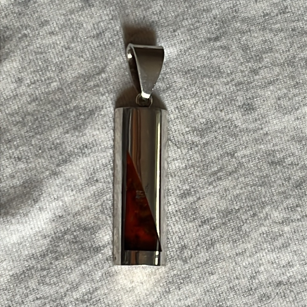 Sterling silver and Amber rounded rectangle pendant with triangle of amber